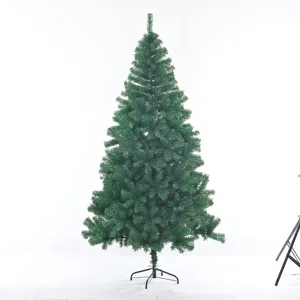 Detail view of artificial Christmas tree green PVC needles with sturdy metal stand.