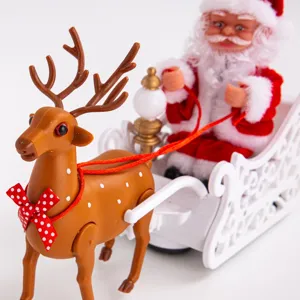 Jouet musical électrique de Père Noël avec traîneau de renne pour décoration de table.