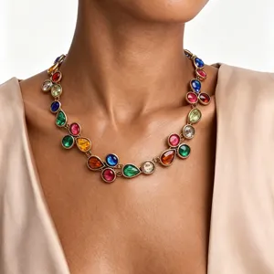 Stunning multi-color rhinestone statement necklace, chic gold-tone geometric party jewelry.