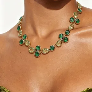 Exaggerated geometric crystal rhinestone necklace with green and yellow teardrop stones for parties.