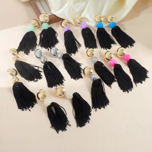 Bohemian long tassel earrings with metal disc and colorful acrylic beads for women, elegant detail view.