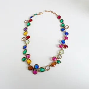 Colorful rhinestone statement necklace detail, multi-color teardrop crystal design.