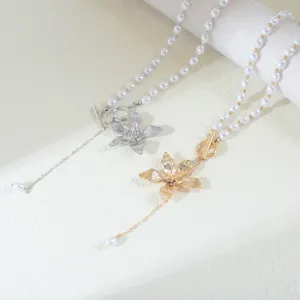 Detailed view of trendy sweet-cool frangipani flower pendant pearl OT buckle necklace