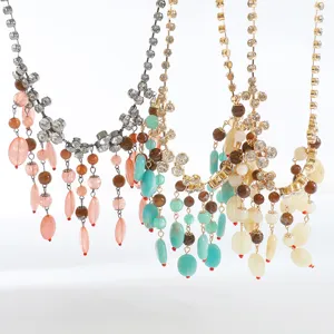 Detailed view of multi-strand rhinestone gemstone tassel pendant necklace for stylish women.
