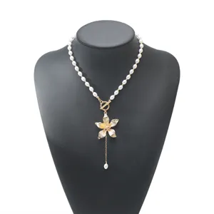 Sweet and cool style frangipani flower pendant necklace with imitation pearls and OT buckle.