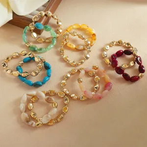 Set di bracciali con perline irregolari in acrilico, gioielli dorati vintage per donne.