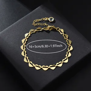Gouden hart schakelarmband detail met nauwkeurige maatspecificaties en prachtig design.