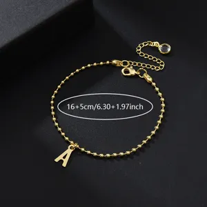 Gouden kralenketting armband met letter A hanger en verlengketting voor dames.
