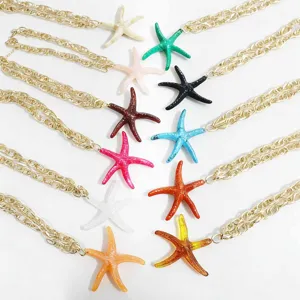 Colorful resin starfish pendant necklace with gold aluminum chain for beach vacation style.