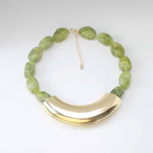 Green resin statement necklace with bold gold curved metal piece, retro chunky choker jewelry.