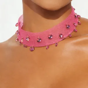 Pink mesh choker necklace with sparkling crystal charms for trendy women fashion daily.