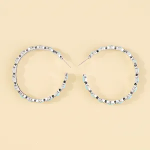 Vintage silver turquoise hoop earrings detailed view, western style jewelry piece.