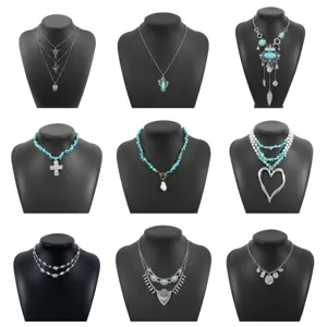 Boho western turquoise necklace set retro multi-layer alloy pendant jewelry for women daily.
