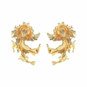 Close-up of irregular textured gold earrings, highlighting unique abstract organic shape.