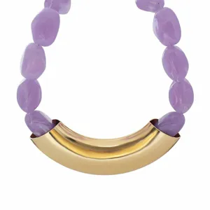 Macro detail view of purple resin beads paired with a curved gold accent statement collar.