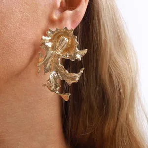 Gold irregular geometric statement earrings, elegant retro metal designer studs for women.