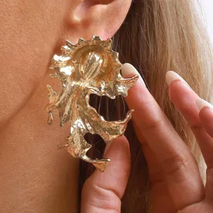 Chic irregular gold metal earrings, vintage geometric design for women, elegant daily wear.