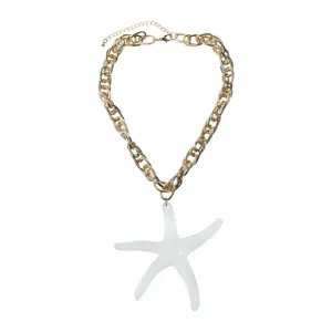 Gold chunky chain necklace featuring a large white resin starfish pendant, beach vacation style.