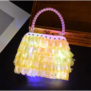 Borsa giocattolo luminosa a LED per bambine, borsa da sera con volant in rete luminosa.