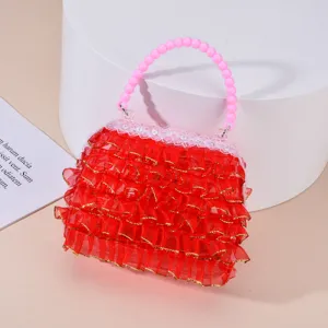 Borsa giocattolo per bambini con manico di perle rosa e dettagli in pizzo rosso.