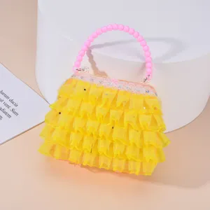 Simpatica borsetta giocattolo luminosa per bambini con balze in tulle giallo e manico di perle.