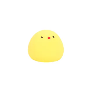 Yellow cute mochi squishy toy, soft stress relief animal figure for kids. Detail view.