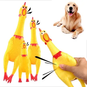 Gelbes gummi schreiendes huhn hundespielzeug, lustiges quietschendes kaukostüm für haustiere.