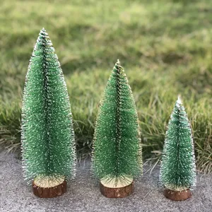 Mini bottle brush Christmas tree detail shot showing realistic pine texture and natural wood base.