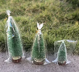 Miniature wooden Christmas tree desktop ornament snow-flocked small tabletop decor detail view