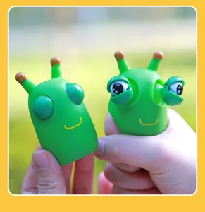 Green pop-eye caterpillar squeeze toy, funny fidget decompression toy for stress relief.