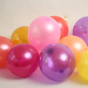 Details of vibrant pearlescent round latex balloons for wedding party and event decoration.