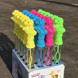 Detailed close-up view of colorful plastic pony-shaped bubble wands neatly displayed in box.