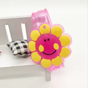 Detail view of the cute cartoon smiling flower glowing silicone slap bracelet toy for kids.