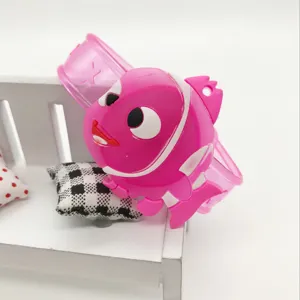 Pink shark cartoon flashing silicone slap bracelet for kids, glowing night wristband toy.
