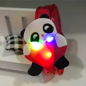 Close-up detail of a cute cartoon panda glowing slap bracelet with colorful LED flashing lights.
