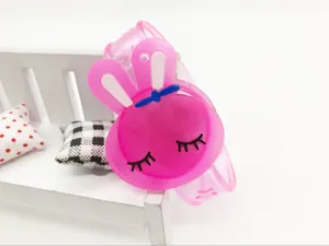 Cute cartoon rabbit luminous silicone slap bracelet for kids, glowing toy watch for party fun.