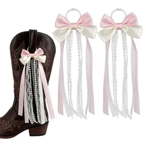 Ruban de noeud decoratif pour bottes de cowboy avec perles, image principale d'accessoire.