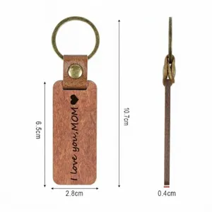 Custom wooden PU leather keychain with engraved message and metal ring, 10.7cm length.