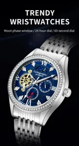 Close-up detail of luxury automatic mechanical wristwatch with sparkling rhinestone bezel and blue dial.