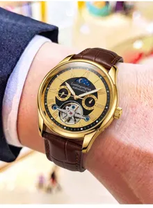 Herren Automatik Mechanische Uhr mit Goldgehäuse, braunem Lederarmband und Mondphase Detail.