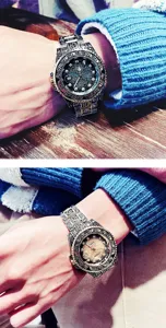 Detailansicht der Luxus Herren Quarzuhr mit graviertem Metallarmband und Zifferblatt.