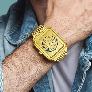 Herren Retro quadratische goldene Skelett Quarzarmbanduhr mit Metallarmband für Alltag.