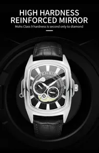 Close-up of the tonneau quartz watch dial showing the clear markers and textured black face.