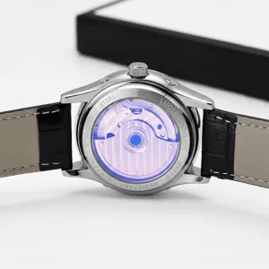 Men's mechanical watch with leather strap and transparent back case displaying movement.