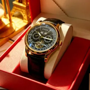 Men's automatic mechanical watch with black dial, gold case, and leather strap for business.