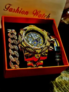 Gold punk style men watch with crystal Cuban link bracelet set in red gift box detail view.