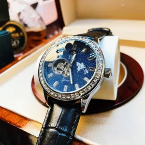 Luxe heren automatisch mechanisch horloge met diamant bezel, sterren wijzerplaat en leer.