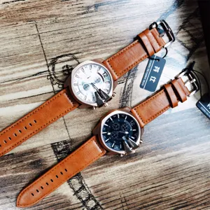 Detail view of FENSIR men quartz watch with big dial, triple sub-dials and brown leather strap.