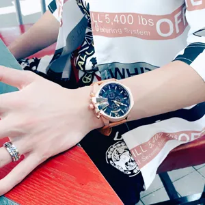 Men's large dial quartz watch with brown leather strap and bold crown guard design.