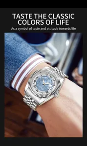 Stainless steel automatic mechanical watch with fluted bezel and blue dial detail.